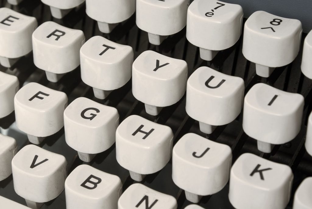 A close up shot of keys on a typewriter.